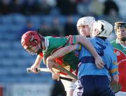 28 November 2004; Richie Hayes, James Stephens, in action against David O'Connor, 3,  and Robbie Kirwan, UCD. AIB Leinster Club Senior Hurling Final, James Stephens v UCD, O'Moore Park, Portlaoise, Co. Laois. Picture credit; Ray McManus / SPORTSFILE