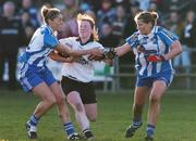 28 November 2004; Aisling O'Connor, Donaghmore, in action against Louise Kelly, left, and Lisa Smith, Ballyboden St. Enda's. AIB Ladies Club All-Ireland Senior Football Final, Donaghmore v Ballyboden St. Enda's, St. Brendan's Park, Birr, Co. Offaly. Picture credit; Pat Murphy / SPORTSFILE