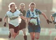 28 November 2004; Fiona Ni Chorcorain, Ballyboden St. Enda's, in action against Aisling O'connor, Donaghmore. AIB Ladies Club All-Ireland Senior Football Final, Donaghmore v Ballyboden St. Enda's, St. Brendan's Park, Birr, Co. Offaly. Picture credit; Pat Murphy / SPORTSFILE
