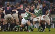 20 November 2004; David Williams, USA, throws the ball back despite the pressure from Ireland's Peter Stringer. Rugby International, Ireland v USA, Lansdowne Road, Dublin. Picture credit; Damien Eagers / SPORTSFILE