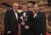 26 November 2004; An Taoiseach Bertie Ahern TD with Paul Flynn of Waterford and GAA President Sean Kelly at the 2004 Vodafone GAA All-Star Awards. Citywest, Dublin. Picture credit; Ray McManus / SPORTSFILE