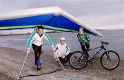 30 November 2004; 2004 Irish Hand Gliding champion Geoff McMahon, left, with Olympic rower Gearoid Towey, centre, and Olympic mountain biker Tarja Owens on Sandymount beach as they make final preparations before heading off to compete in a unique international sports event 'Red Bull Giants of Rio' in Rio De Janeiro, Brazil on Sunday 5th December. Sandymount Beach, Dublin. Picture credit; David Maher / SPORTSFILE