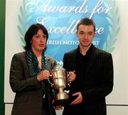 30 November 2004; Irish Karting Champion Aaron Coby of Meath is presented with the King Hussein of Jordan trophy by Audrey Gargan, Alfa Romeo, at the Alfa Romeo / Motorsport Ireland Awards for Excellence in Irish Motorsport 2004. Conrad Hotel, Dublin. Picture credit; Pat Murphy / SPORTSFILE