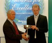 30 November 2004; Young Rally Driver of the year Eamon McElvaney is presented with the Billy Coleman award by Billy Coleman at the Alfa Romeo / Motorsport Ireland Awards for Excellence in Irish Motorsport 2004. Conrad Hotel, Dublin. Picture credit; Pat Murphy / SPORTSFILE