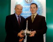 30 November 2004; Young Racing Driver of the year Eoin Murray is presented with the Dunlop Sexton Trophy by Richard Warbrick, Dunlop, at the Alfa Romeo / Motorsport Ireland Awards for Excellence in Irish Motorsport 2004. Conrad Hotel, Dublin. Picture credit; Pat Murphy / SPORTSFILE