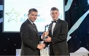 8 November 2013; Sean McVeigh, Donegal, receives his 2013 GAA GPA Nicky Rackard Cup award from Desie Farrell, Chief Executice, GPA. GAA GPA All-Star Awards 2013 Sponsored by Opel, Croke Park, Dublin. Picture credit: Brendan Moran / SPORTSFILE