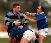 18 April 1998; Anthony Foley of Shannon RFC is tackled by Frank Fitzgerald, left, and Craig Fitzpatrick of  St. Mary's RFC during the All-Ireland League Division 1 Semi-Final match between Shannon RFC and St Mary's College RFC at Thomond Park in Limerick. Photo by Matt Browne/Sportsfile