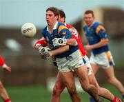 7 February 1999; Barry O'Donovan of Wicklow is tackled by Seamus O'Hanlon of Louth during the National Football League match between Louth and Wicklow at O'Rahilly Park in Drogheda, Louth. Photo by Brendan Moran/Sportsfile