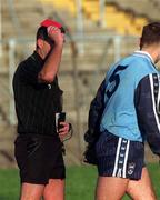 16 January 1999;  Referee Brendan Ryan mistakenly issues a red card instead of a yellow card to Paul Curran of Dublin for throwing the ball away during the O'Byrne Cup Quarter-Final match between Carlow and Dublin at Dr Cullen Park in Carlow. Photo by Ray McManus/Sportsfile