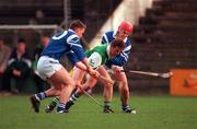 8 November 1998; Charlie Carter of Leinster in action against Mark Foley and Stephen Frampton of Leinster during the Railway Cup Semi-Final match between Leinster and Munster at Nowlan Park in Kilkenny. Photo by Ray McManus/Sportsfile