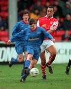 7 February 1999; Ciaran Kavanagh of UCD in action against Paul Osam of St Patrick's Athletic during the Harp Lager FAI Cup Second Round match between St Patrick's Athletic and UCD at Richmond Park in Dublin. Photo by Damien Eagers/Sportsfile