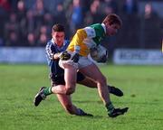 29 November 1998; Colm Quinn of Offaly in action against Enda Sheehy of Dublin during the Church & General National Football League Division 1A match between Offaly and Dublin at O'Connor Park in Tullamore. Photo by Matt Browne/Sportsfile