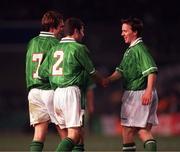 10 February 1999; David Connolly of Republic of Ireland is congratulated by team-mates Denis Irwin and Jason McAteer after scoring his side's second goal during the International Friendly match between Republic of Ireland and Paraguay at Lansdowne Road in Dublin. Photo by David Maher/Sportsfile