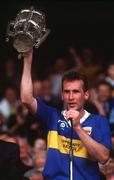 1 September 1991; Tipperary captain Declan Carr lifts the Liam MacCarthy trophy following the All-Ireland Senior Hurling Championship Final match between Tipperary and Kilkenny at Croke Park in Dublin. Photo by Ray McManus/Sportsfile