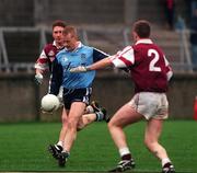 30 January 1999; Declan Darcy of Dublin in action against Aidan Lyons, right, of Westmeath during the O'Byrne Cup Semi-Final match between Dublin and Westmeath at Parnell Park in Dublin. Photo by Aoife Rice/Sportsfile