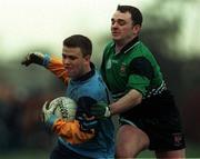 9 February 1999; Derek Savage of UCD is tackled by Aidan O'Rourke of QUB during the Sigerson Cup Round 1 match between UCD and QUB at Belfield in Dublin. Photo by Matt Browne/Sportsfile
