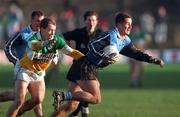 29 November 1998; Enda Sheedy of Dublin  in action with Finbar Cullen of Offaly during the Church & General National Football League Division 1A match between Offaly and Dublin at O'Connor Park in Tullamore. Photo by Matt Browne/Sportsfile