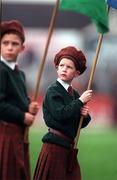 31 January 1999; Two members of the Patrician Primary Pipers band watch the teams arrive onto the field prior to the AIB Leinster Club Football Championship Final 2nd Replay match between Éire Og and Kilmacud Crokes at St Conleths Park in Newbridge, Kildare. Photo by Ray McManus/Sportsfile