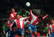 10 February 1999; Niall Quinn of Republic of Ireland in action against Jorge Villar, Edgar Aguilera and Juan Ortiz  of Paraguay during the International Friendly match between Republic of Ireland and Paraguay at Lansdowne Road in Dublin. Photo by David Maher/Sportsfile