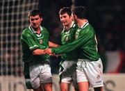 10 February 1999; Denis Irwin of Republic of Ireland, centre, celebrates scoring his side's first goal with team-mates Roy Keane, left, and Mark Kinsella, right, during the International Friendly match between Republic of Ireland and Paraguay at Lansdowne Road in Dublin. Photo by Ray McManus/Sportsfile