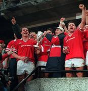 30 January 1999; Ulster players, from left, Mark Blair, Mark McCall, Simon Mason, coach Harry Williams and Allen Clarke celebrate with the trophy following the Heineken Cup Final match between Ulster and Colomiers at Lansdowne Road, Dublin. Photo by Brendan Moran/Sportsfile