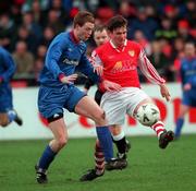 7 February 1999; Martin Russell of St Patrick's Athletic in action against Tony McDonnell of UCD during the Harp Lager FAI Cup Second Round match between St Patrick's Athletic and UCD at Richmond Park in Dublin. Photo by Damien Eagers/Sportsfile