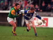 13 February 1999; Michael Lambe of Laois in action against Paddy Hegarty of Meath during the Leinster Under 21 Football Championship First Round Replay match between Laois and Meath at O'Moore Park in Portlaoise, Laois. Photo by Ray McManus/Sportsfile