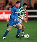 17 January 1999; Michael O'Byrne of UCD in action against Terry Palmer of Shamrock Rovers during the Harp Lager National League Premier Division match between UCD and Shamrock Rovers at Belfield Park in Dublin. Photo by Ray McManus/Sportsfile