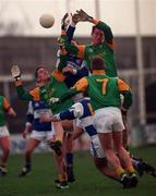 13 February 1999; Nigel Crawford of  Meath in action against Martin Delaney of Laois during the Leinster Under 21 Football Championship First Round Replay match between Laois and Meath at O'Moore Park in Portlaoise, Laois. Photo by Ray McManus/Sportsfile
