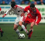 31 January 1999; Ollie Cahill of Cork City is tackled by Eoin Heery of Shelbourne during the Harp Lager National League Premier Division match between Shelbourne and Cork City at Tolka Park in Dublin. Photo by Ray Lohan/Sportsfile