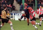 14 February 1999; Paul Osam St Patrick's Athletic in action against  David Platt and Darren Kelly of Derry City during the Harp Lager National League Premier Division match between Derry City and St Patrick's Athletic at The Brandywell Stadium in Derry. Photo by Ray Lohan/Sportsfile