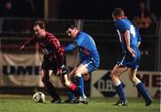 22 January 1999; Peter Hanrahan of Bohemians in action against Pat Scully and Tony McCarthy of Shelbourne during the Harp Lager National League Premier Division match between Bohemians and Shelbourne at Dalymount Park in Dublin. Photo by David Maher/Sportsfile