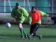 9 February 1999; Phil Babb gets the ball away from Alan McLoughlin during a Republic of Ireland training session at the AUL Grounds in Clonshaugh, Dublin. Photo by Matt Browne/Sportsfile