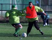 9 February 1999; Phil Babb is tackled by Alan McLoughlin during a Republic of Ireland training session at the AUL Grounds in Clonshaugh, Dublin. Photo by Matt Browne/Sportsfile