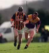 7 February1999; Philip Larkin of Kilkenny in action against Seanie Colfer of Wexford during the Walsh Cup Semi-Final match between Kilkenny and Wexford in Mullinavat in Kilkenny. Photo by Ray McManus/Sportsfile