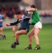 14 February 1999; Senan Connell of Dublin in action against Derek Kelleher of Leitrim during the Church & General National Football League Division 1 match between Dublin and Leitrim at Parnell Park in Dublin. Photo by Damien Eagers/Sportsfile