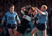 20 December 1998; Senan Hehir of Doonbeg in action against Liam Cronin of Moyle Rovers during the AIB Munster Senior Club Football Championship Final Replay match between Doonbeg and Moyle Rovers at the Gaelic Grounds in Limerick. Photo by Ray McManus/Sportsfile