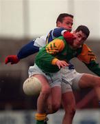 13 February 1999; Stephen Smith of  Meath in action against Tom Kelly of Laois during the Leinster Under 21 Football Championship First Round Replay match between Laois and Meath at O'Moore Park in Portlaoise, Laois. Photo by Ray McManus/Sportsfile