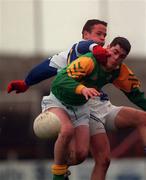 13 February 1999; Stephen Smith of Meath in action against Tom Kelly of Laois during the Leinster Under 21 Football Championship First Round Replay match between Laois and Meath at O'Moore Park in Portlaoise, Laois. Photo by Ray McManus/Sportsfile