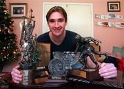 23 December 1998; Waterford hurler Tony Browne with some of the trophies he won this year pictured at his home in Waterford City. Photo by David Maher/Sportsfile