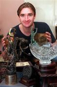 23 December 1998; Waterford hurler Tony Browne with some of the trophies he won this year pictured at his home in Waterford City. Photo by David Maher/Sportsfile