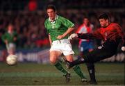 10 February 1999; Tony Cascarino of Republic of Ireland closes down Ricardo Tavarelli of Paraguay during the International Friendly match between Republic of Ireland and Paraguay at Lansdowne Road in Dublin. Photo by David Maher/Sportsfile