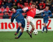 7 February 1999; Trevor Molloy of St Patrick's Athletic in action against Aidan Lynch of UCD during the Harp Lager FAI Cup Second Round match between St Patrick's Athletic and UCD at Richmond Park in Dublin. Photo by Matt Browne/Sportsfile