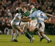 27 November 2004; Brian O'Driscoll, Ireland, in action against Felipe Contepomi and Martin Durand (6), Argentina. Rugby International, Ireland v Argentina, Lansdowne Road, Dublin. Picture credit; Brendan Moran / SPORTSFILE