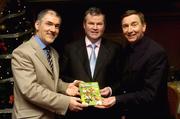 2 December 2004; Author and RTE Gaelic Games Correspondent, Brian Carthy, centre, with Tyrone Manager Mickey Harte, left, and Fr Brian Darcy, at the launch of his new book &quot; The Championship 2004&quot;. Citywest Hotel, Dublin. Picture credit; Damien Eagers / SPORTSFILE