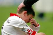 3 December 2004; A dejected Sean Rogers, Scoil Fhiachra,  Beaumont, after defeat to Scoil Cholmcille, Knocklyon. Allianz Cumann na mBunscol Football Final, Corn Kitterick, Scoil Cholmcille, Knocklyon v Scoil Fhiachra, Beaumont, Croke Park, Dublin. Picture credit; David Maher / SPORTSFILE