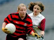 3 December 2004; Michelle Clancy, Scoil Cholmcille, Knocklyon, in action against Laura Materson, Scoil Bhride, Castleknock. Allianz Cumann na mBunscol Football Final, Corn Austin Finn, Scoil Cholmcille, Knocklyon v Scoil Bhride, Castleknock, Croke Park, Dublin. Picture credit; David Maher / SPORTSFILE