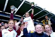 3 December 2004; Michelle O'Reilly, captain, Scoil Bhride, Castleknock, is carried shoulder high by team-mates after victory over Scoil Cholmcille, Knocklyon. Allianz Cumann na mBunscol Football Final, Corn Austin Finn, Scoil Cholmcille, Knocklyon v Scoil Bhride, Castleknock, Croke Park, Dublin. Picture credit; David Maher / SPORTSFILE