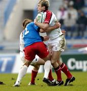 4 December 2004; Tomm Bowe, Ulster, is tackled by Brian Liebenberg, Stade Francais. Heineken European Cup 2004-2005, Pool 6, Round 3, Stade Francais v Ulster, Stade Jean Bouin, Paris, France. Picture credit; Brian Lawless / SPORTSFILE
