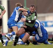 4 December 2004; Eric Elwood, Connacht, in action against Yannick Saladie, left and Michel Macurdy, Montpellier. European Challenge Cup 2004-2005, Connacht v Montpellier, Sportsground, Galway. Picture credit; Damien Eagers / SPORTSFILE